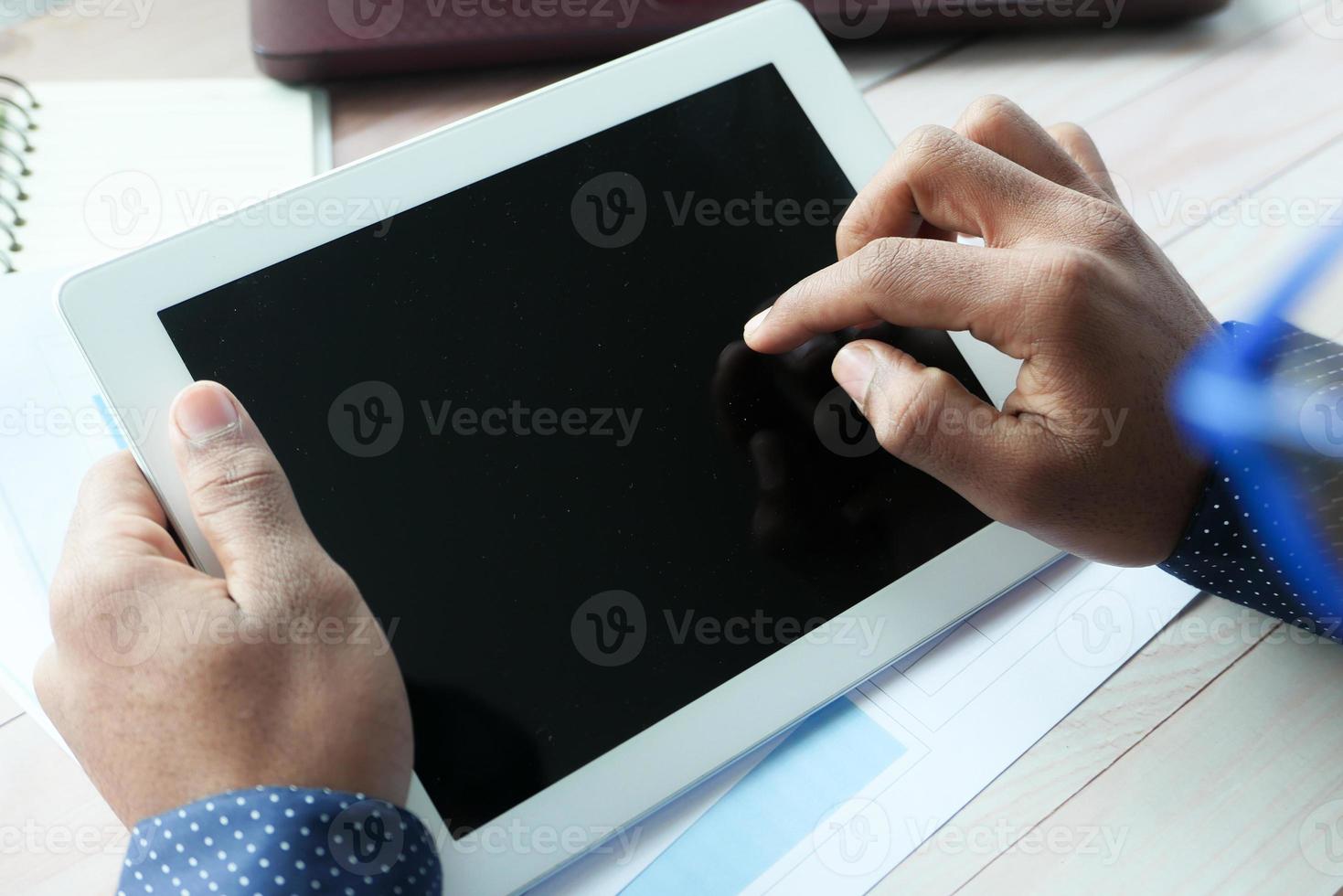 Business person using digital tablet photo