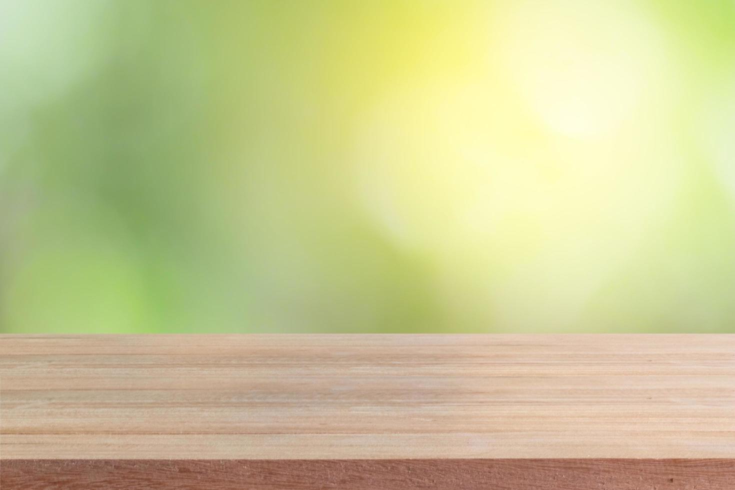 Wooden table with natural background photo