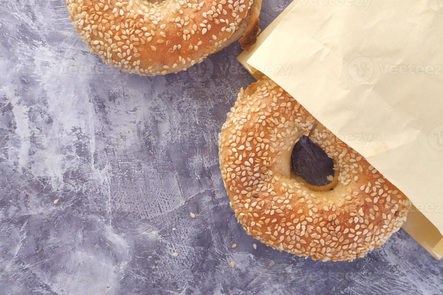 Fresh bagel on a table photo