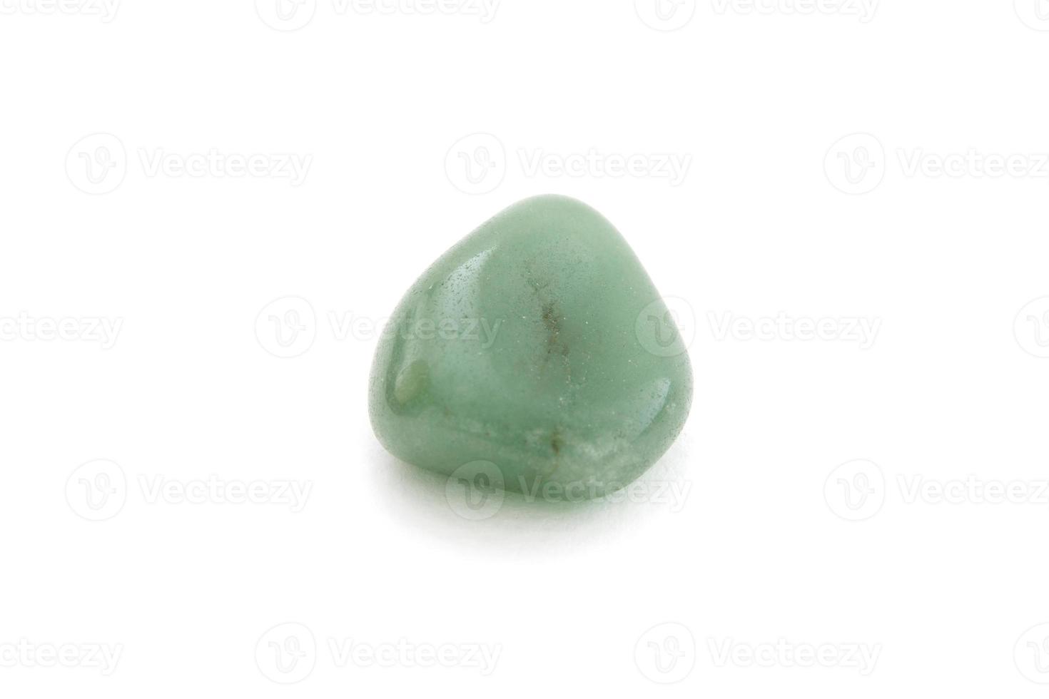 Green agate mineral on the white background photo