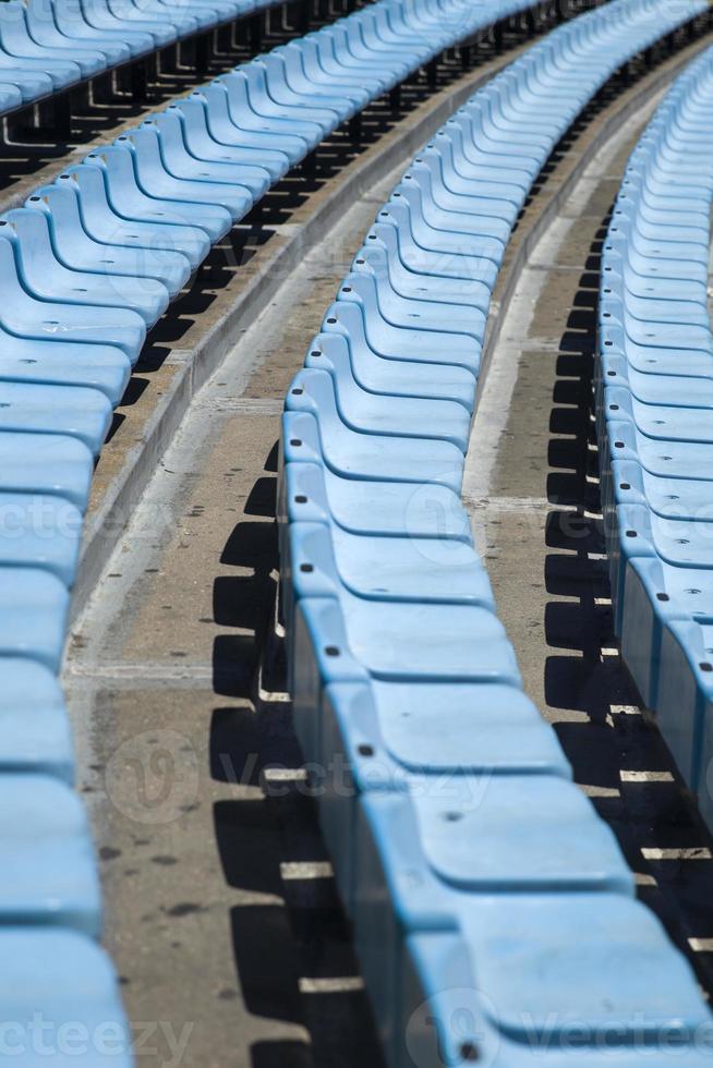 Closeup detail of the blue stadium seats photo