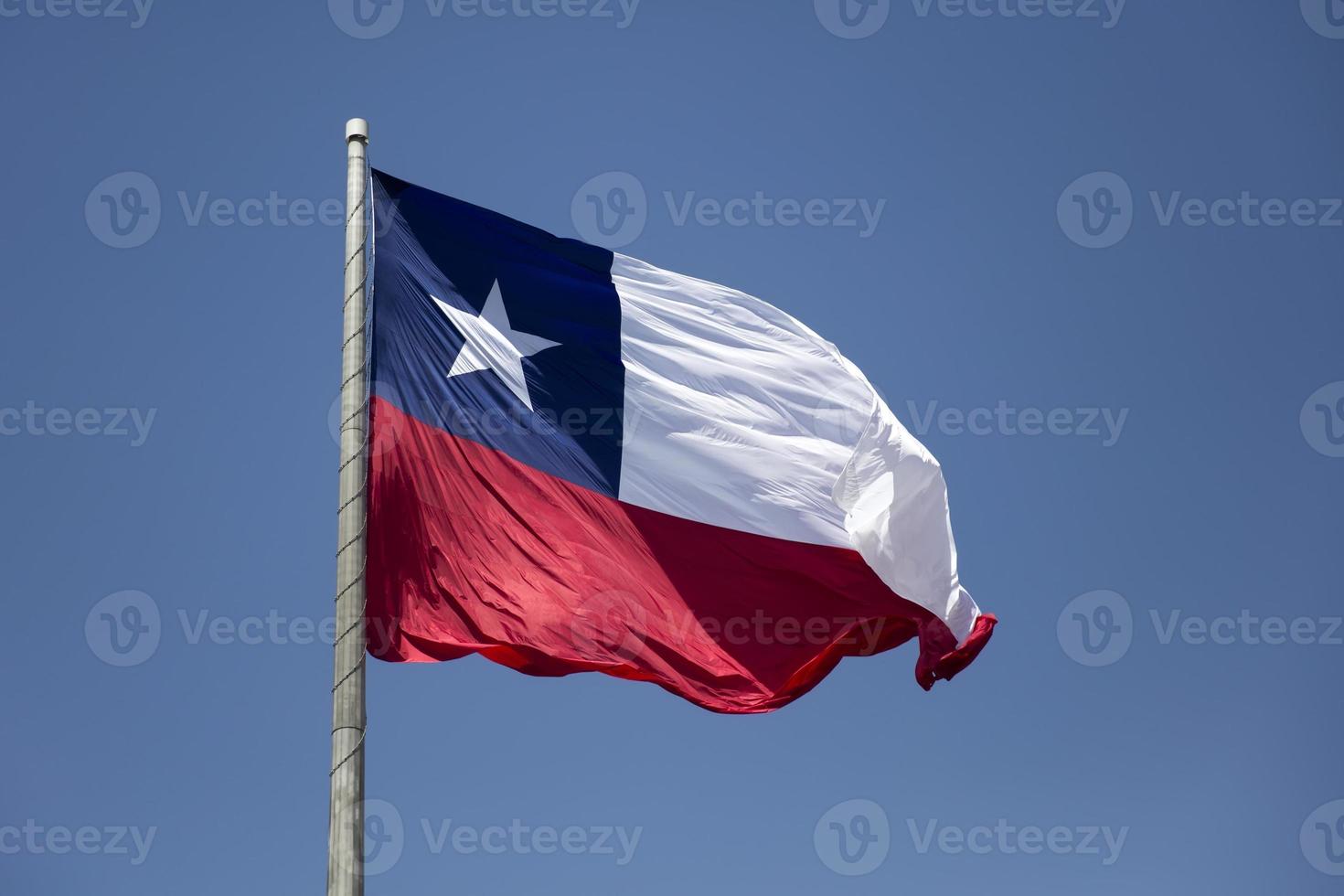 Chilean flag under blue sky photo