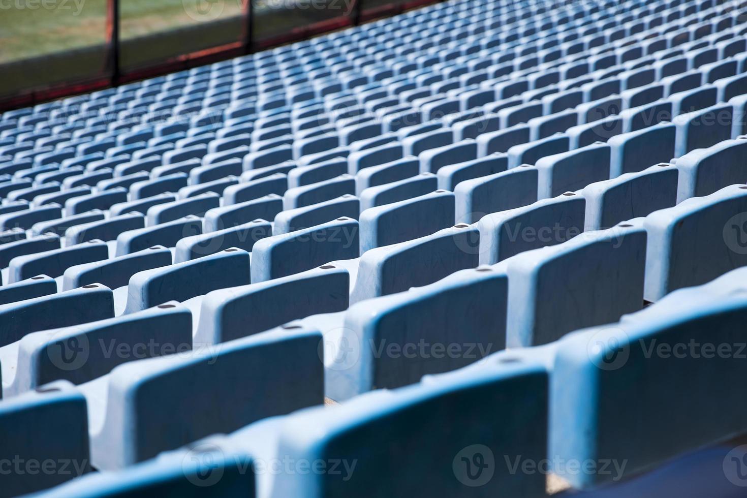 Closeup detail of the blue stadium seats photo