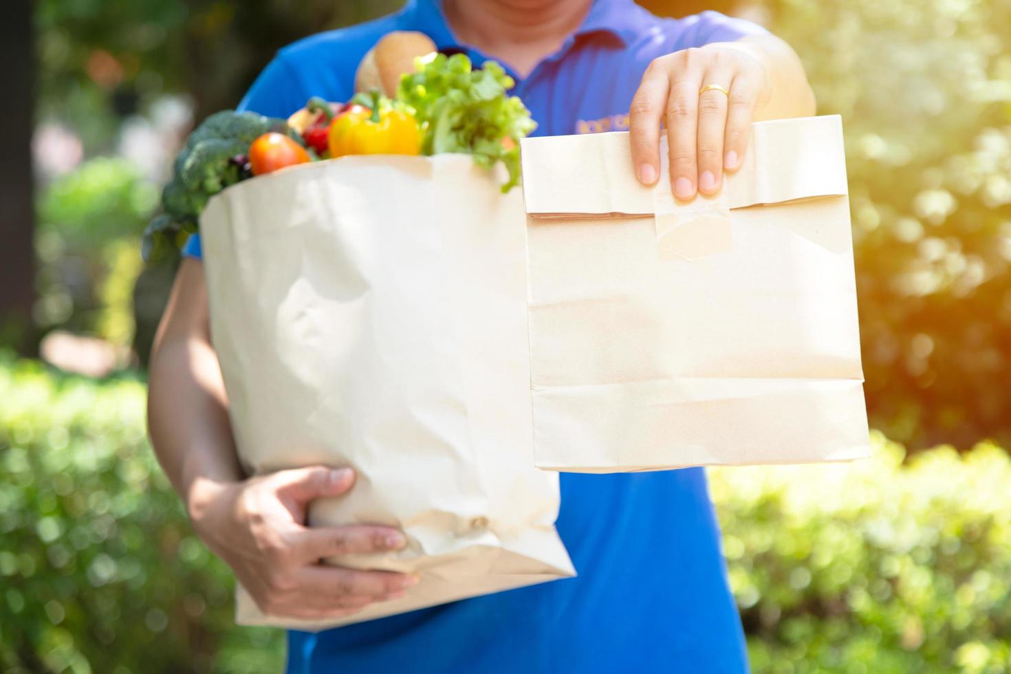 Foodservice providers wearing masks and gloves. Stay at home reduces the spread of the Covid-19 virus photo