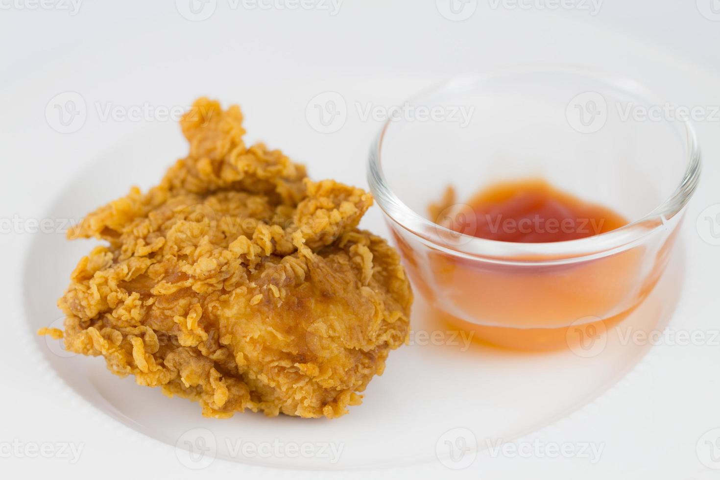 Fresh fried chicken on a white plate photo