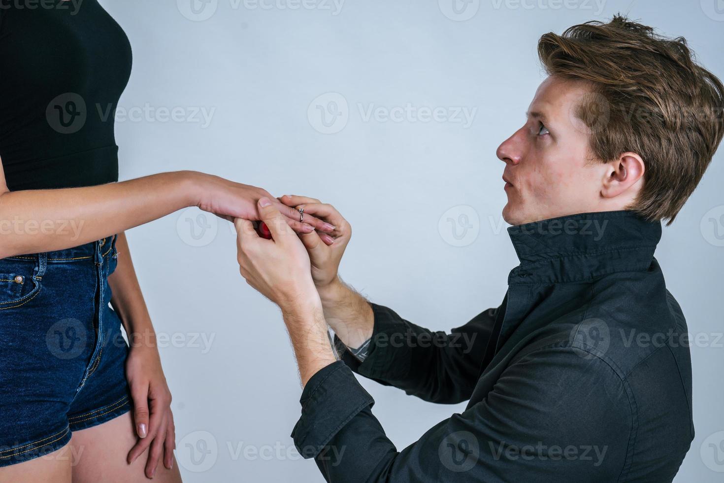 Happy portrait of couple during surprise marriage photo