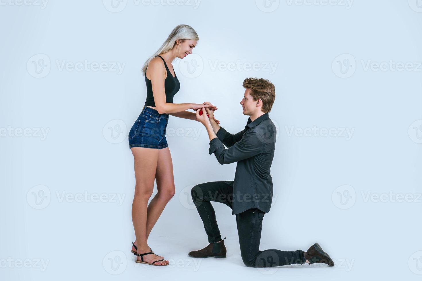 Happy portrait of couple during surprise marriage photo