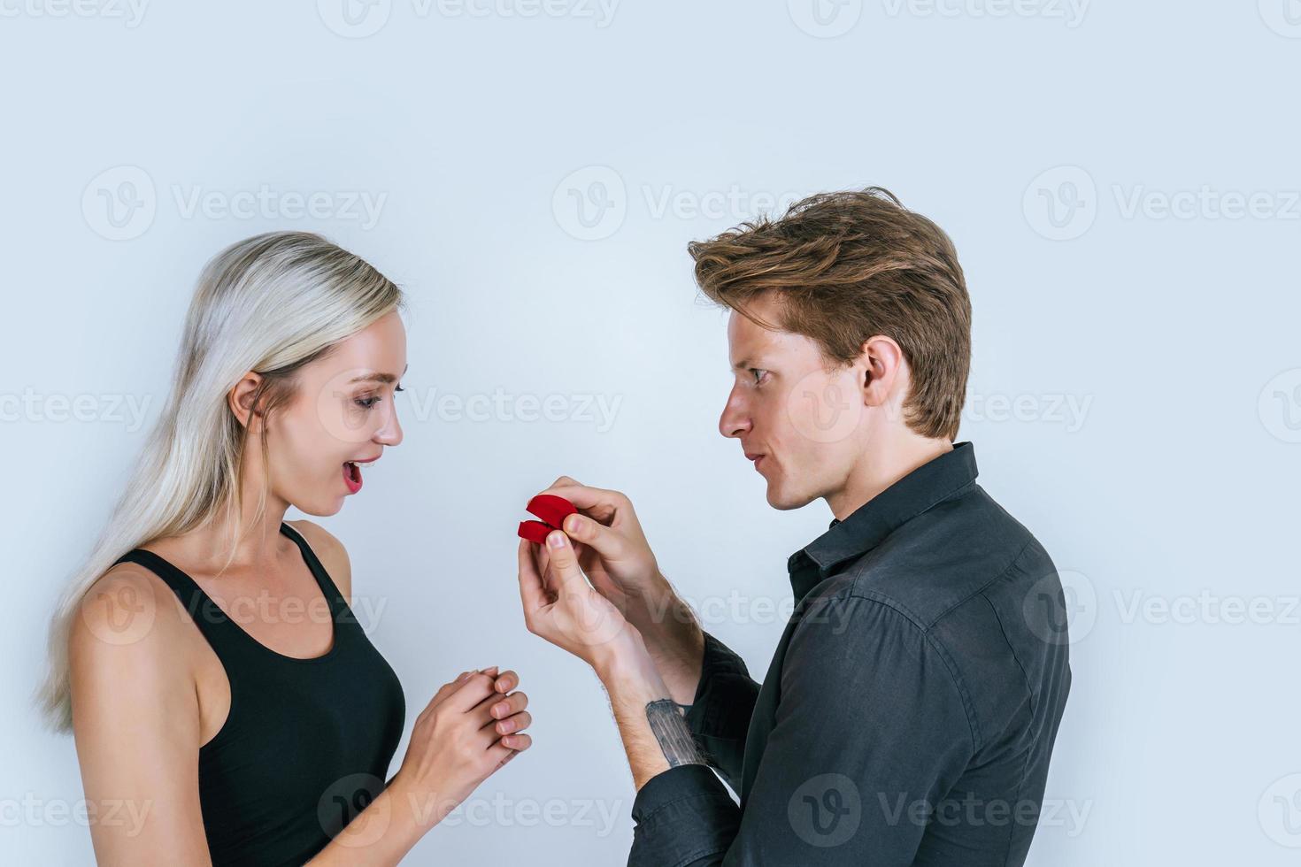 Happy portrait of couple during surprise marriage photo