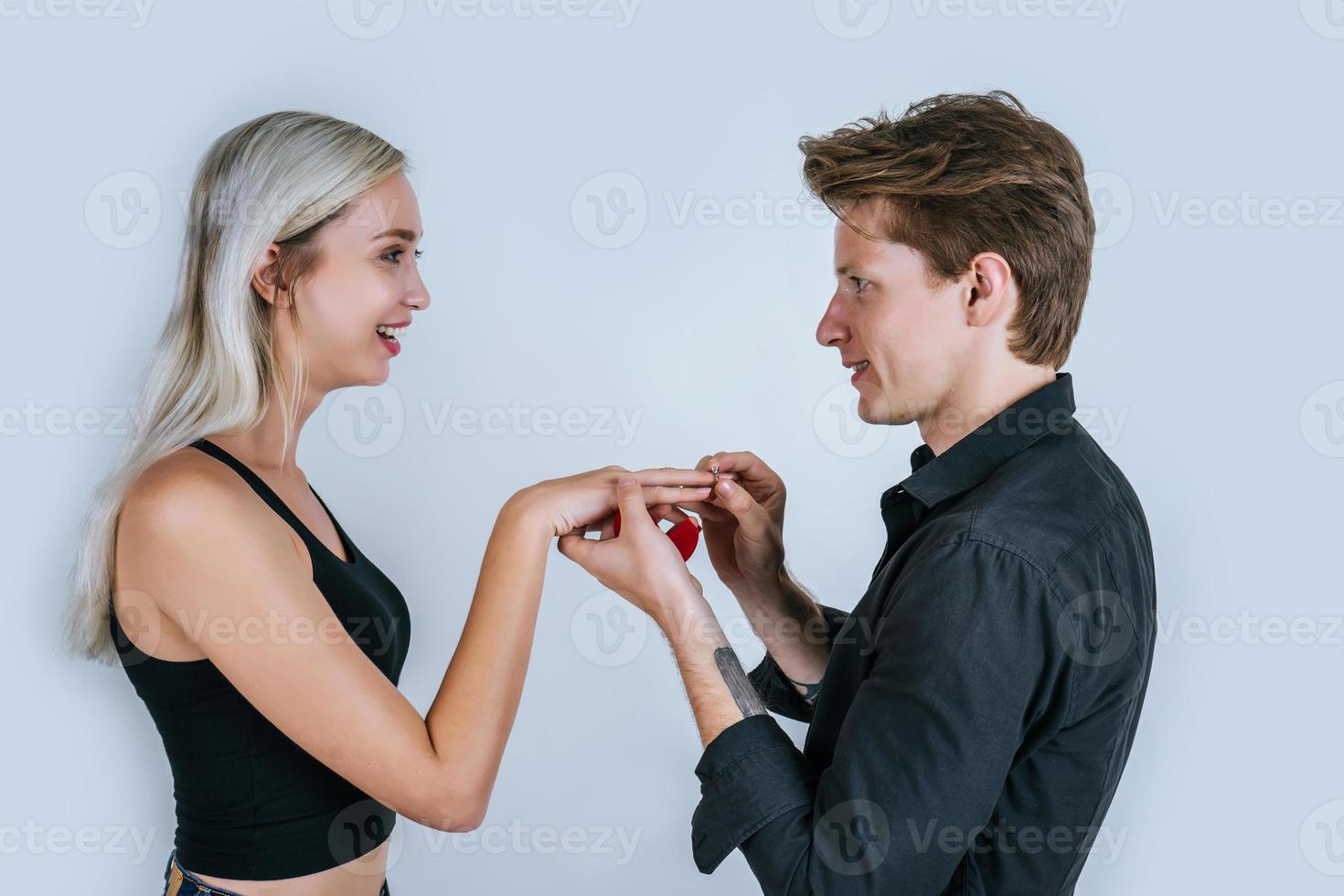 Happy portrait of couple during surprise marriage photo