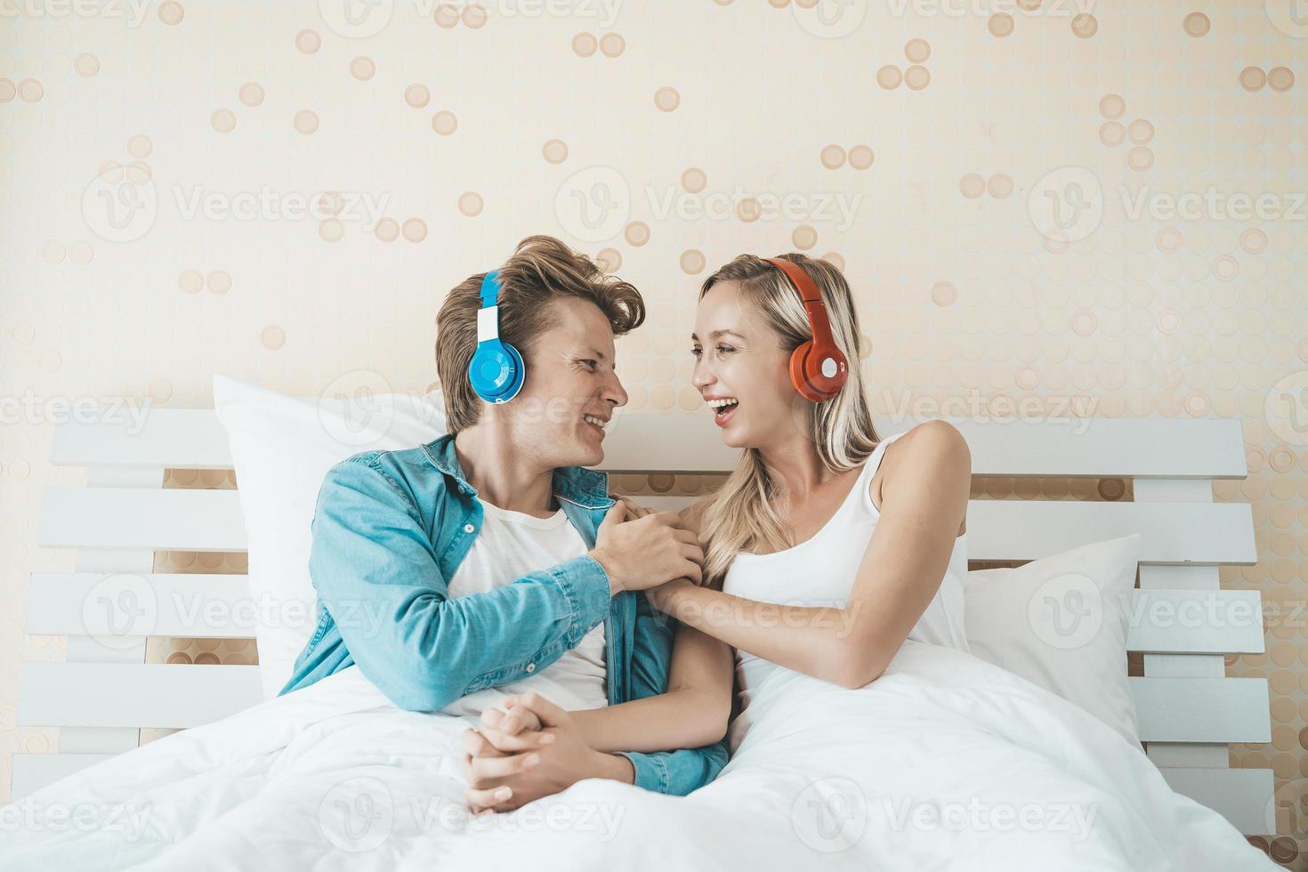 Happy couple listening to songs in the morning photo