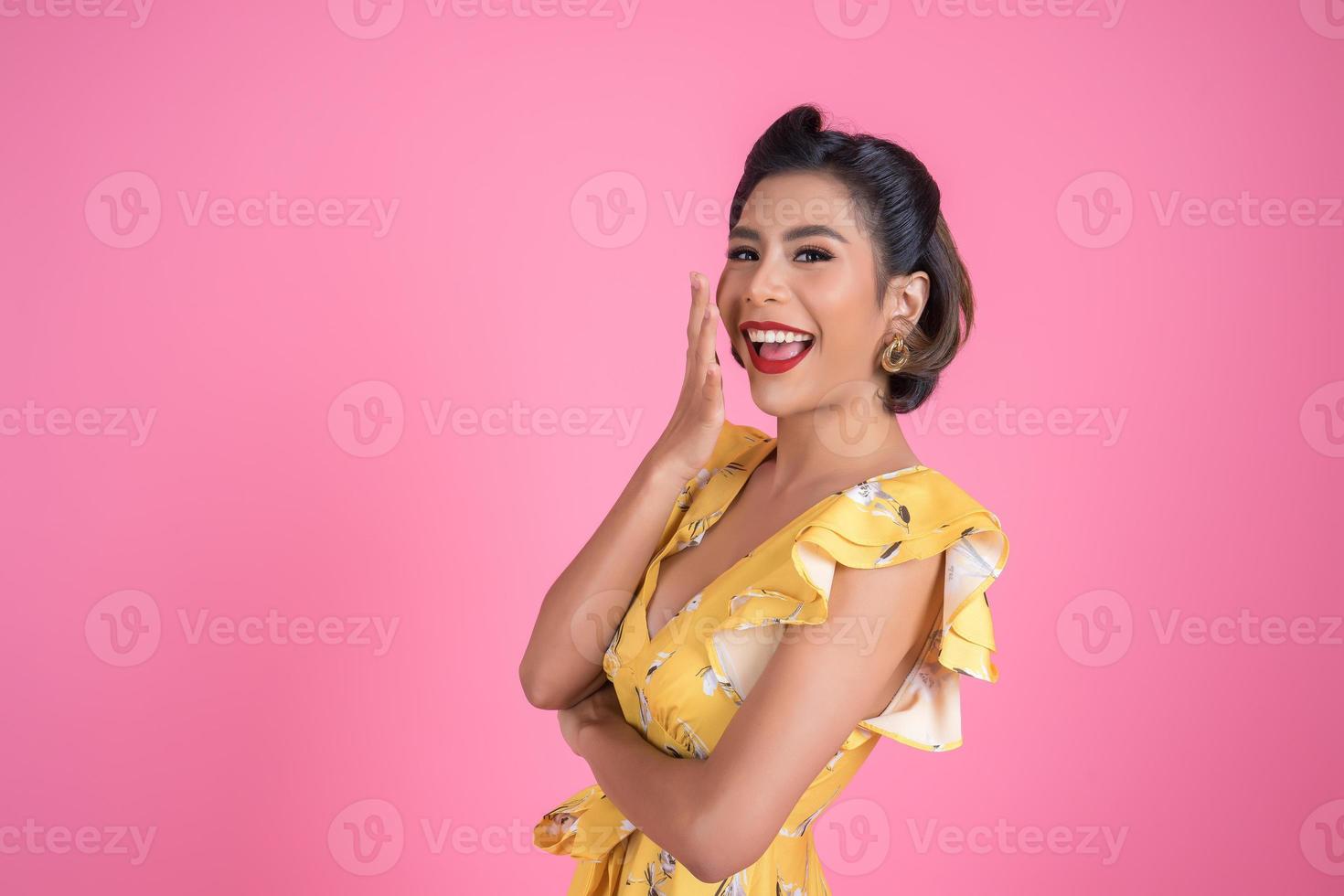 Portrait of fashionable woman in studio photo