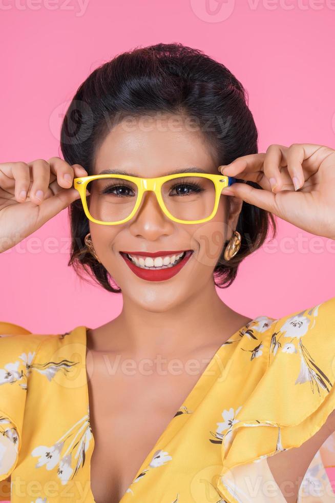 Portrait of fashionable woman with sunglasses photo