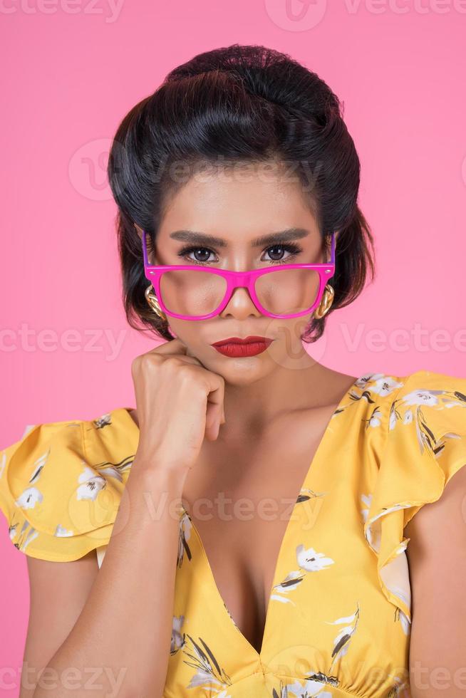 Portrait of fashionable woman with sunglasses photo