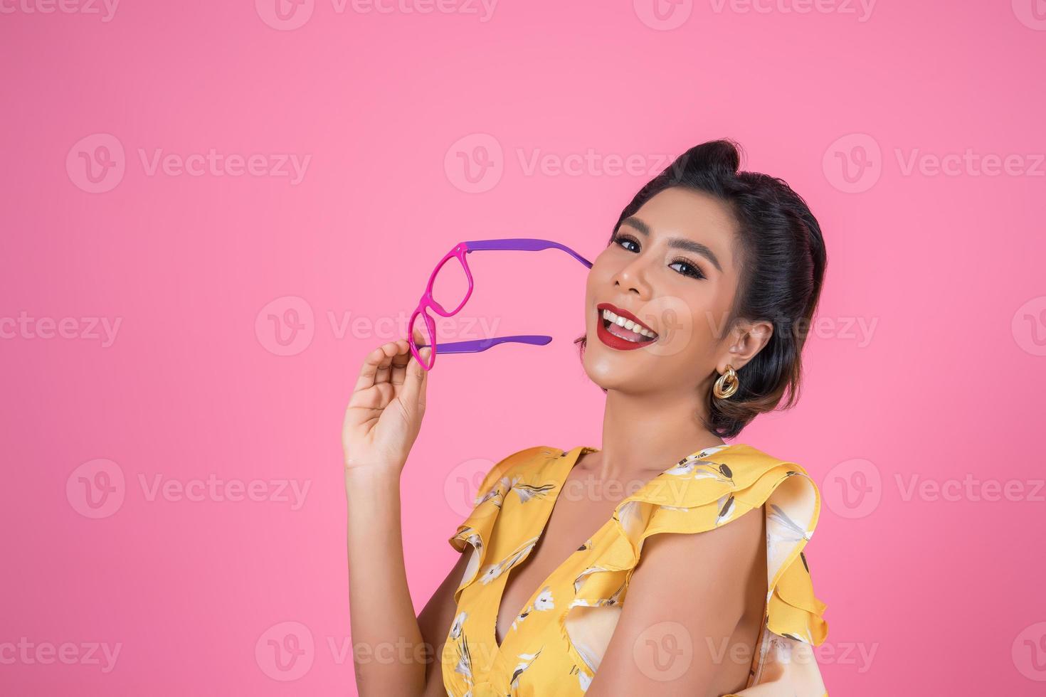 Portrait of fashionable woman with sunglasses photo