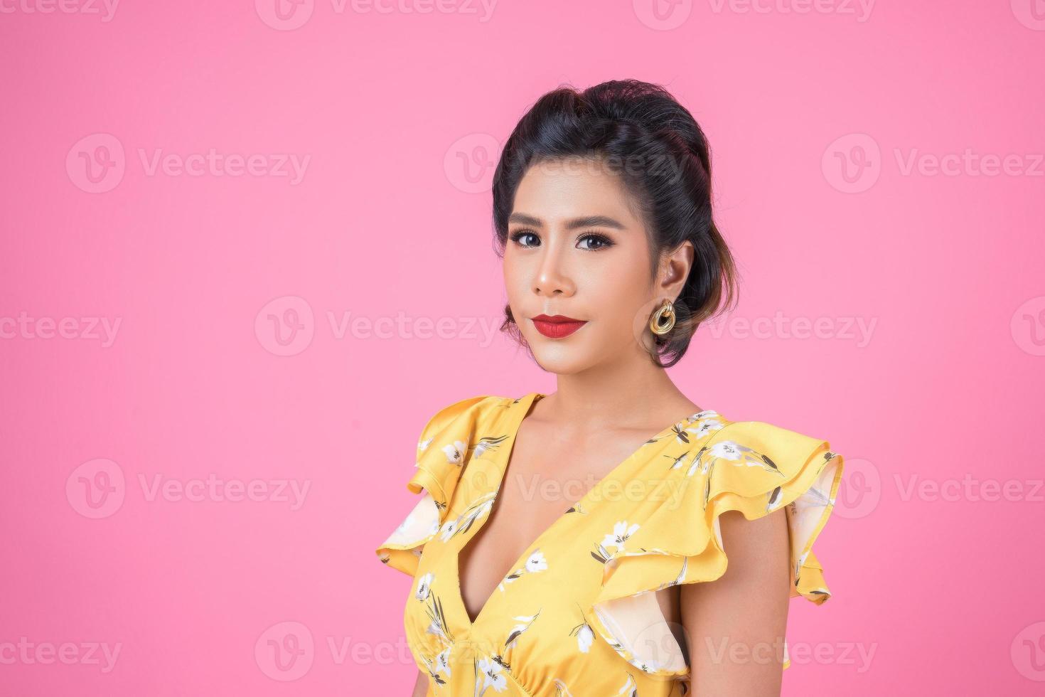 Portrait of fashionable woman in studio photo