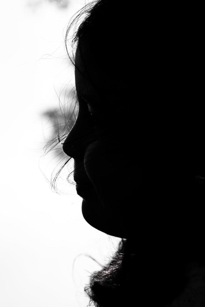 Silhouette of a little girl photo