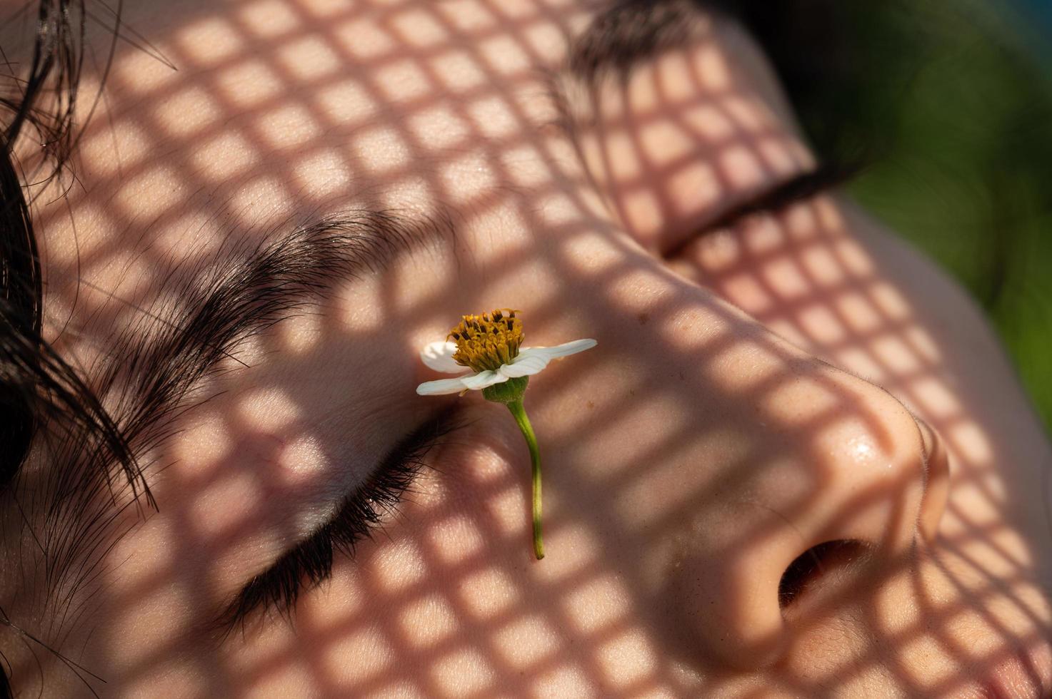 Shaded lighting on the face of a child photo