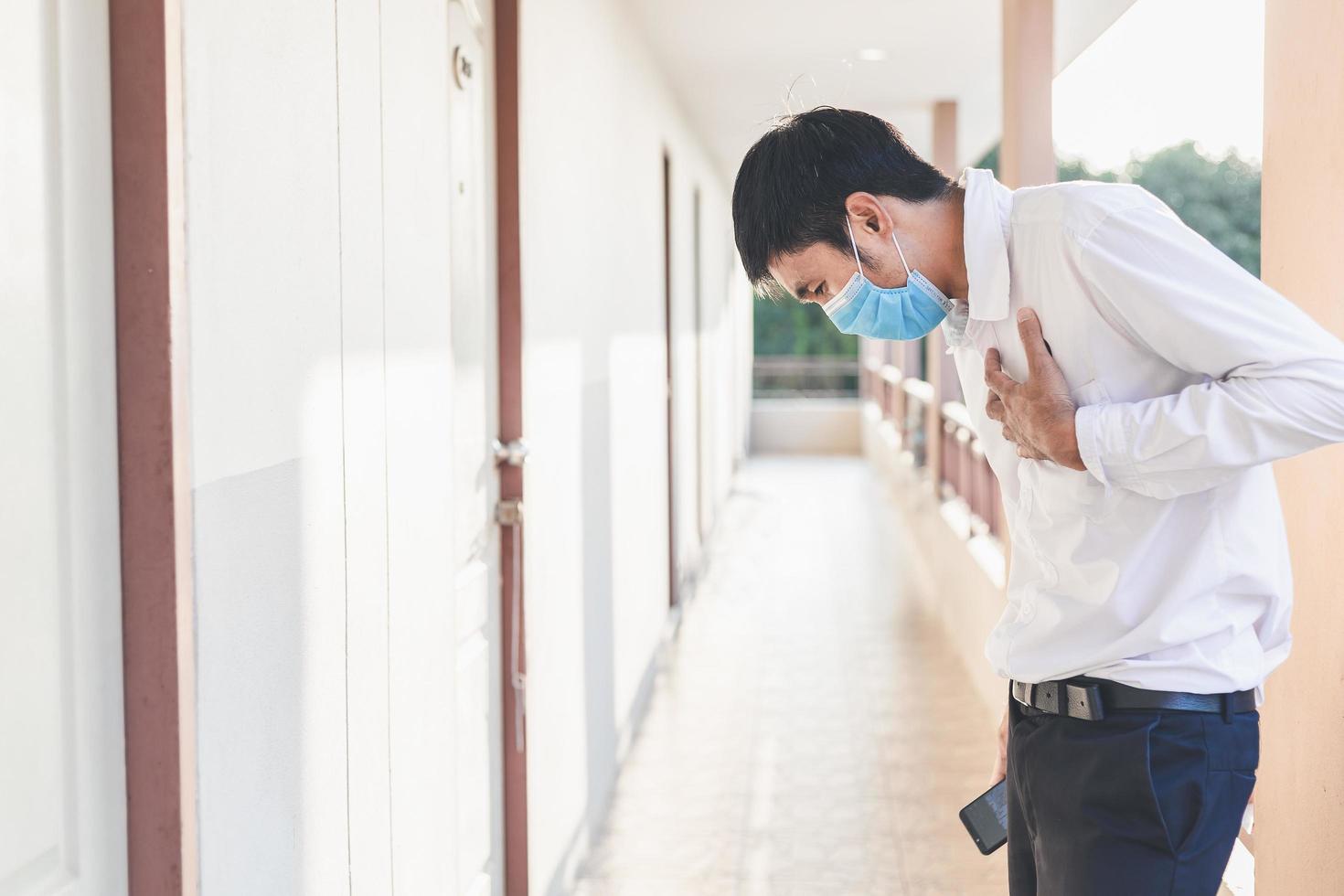 Asian man wearing a mask photo