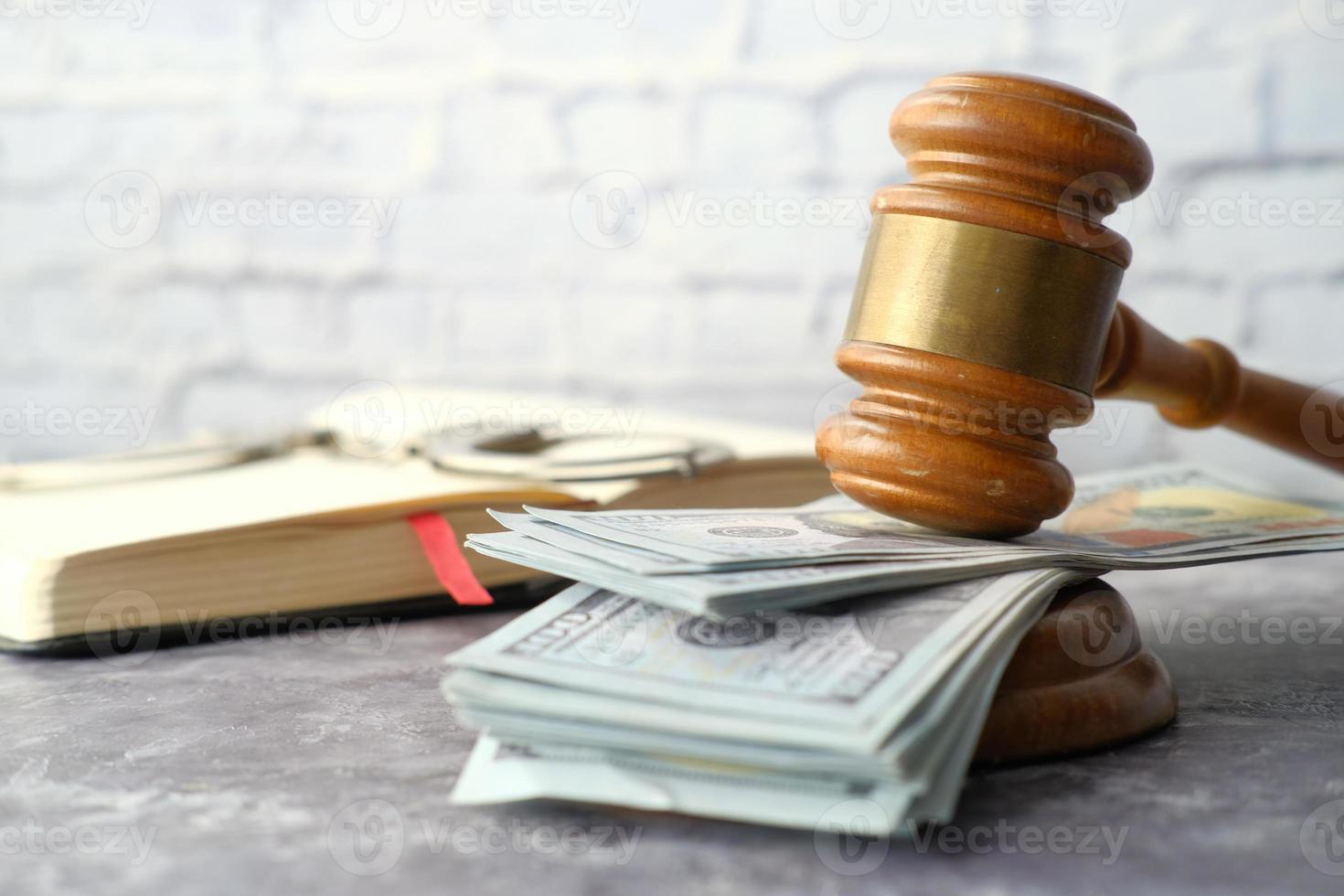 Close up of a gavel and cash photo