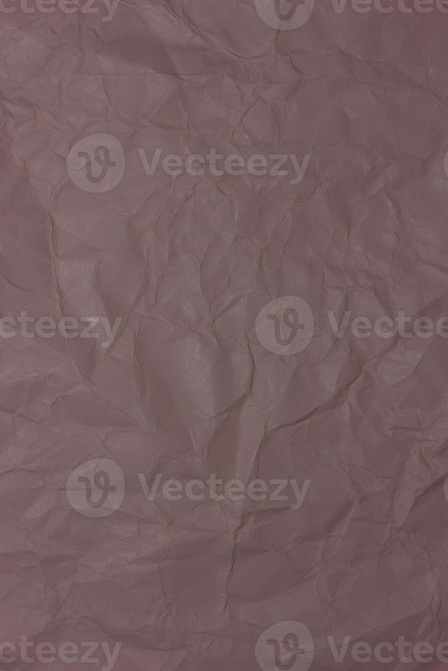 Brown crumpled paper background texture photo