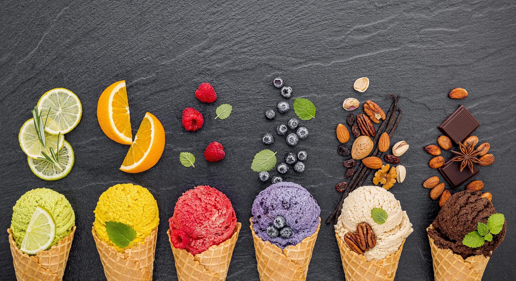 Ice cream and toppings on slate photo