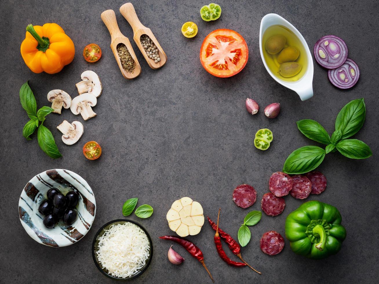 Italian ingredients on a dark background photo