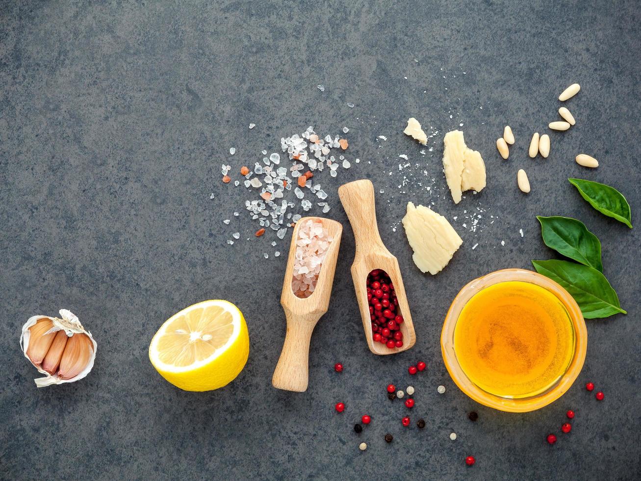 Lemon vinaigrette ingredients on a gray background photo