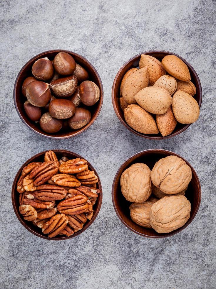 Top view of nuts in bowls photo