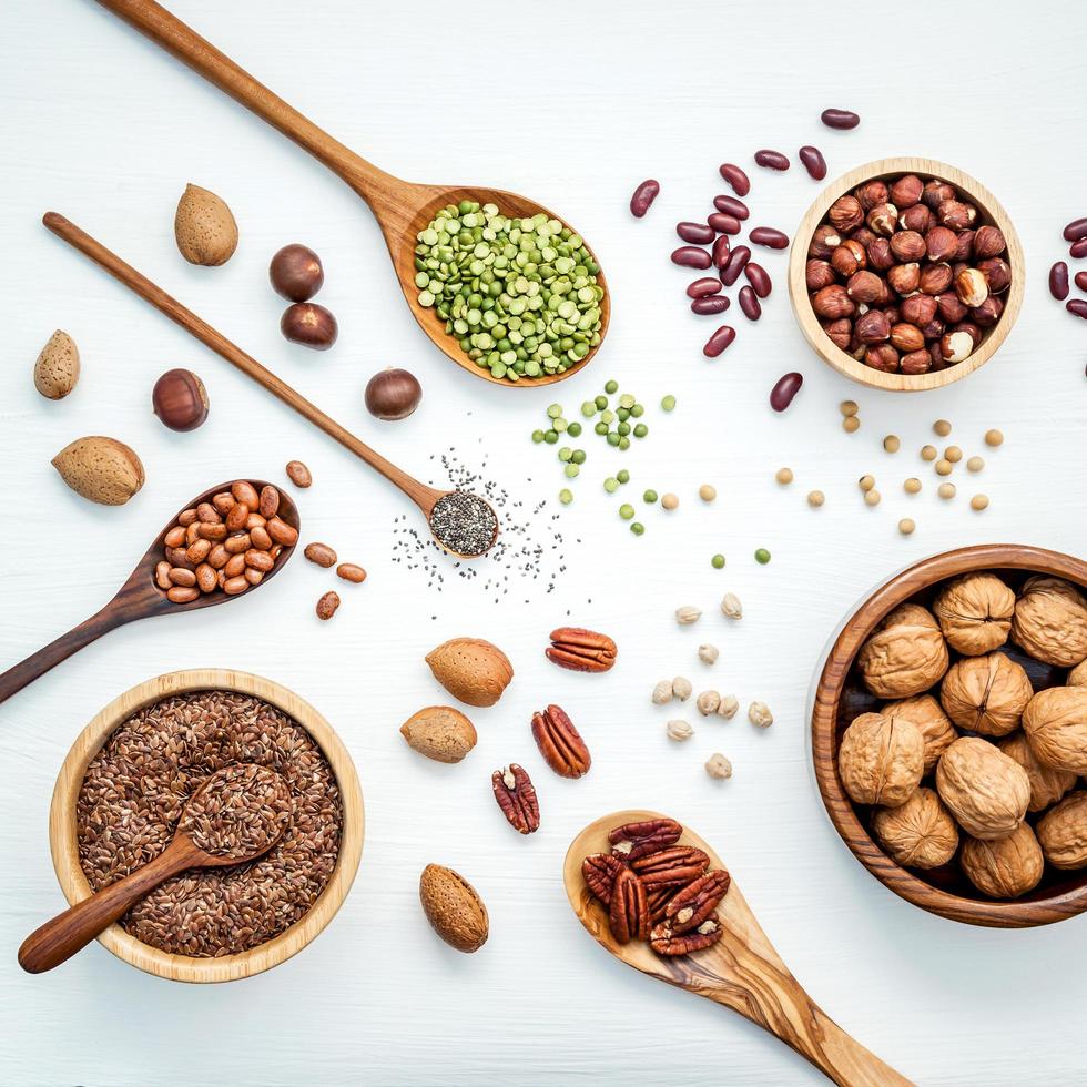 Assorted legumes on a white background photo