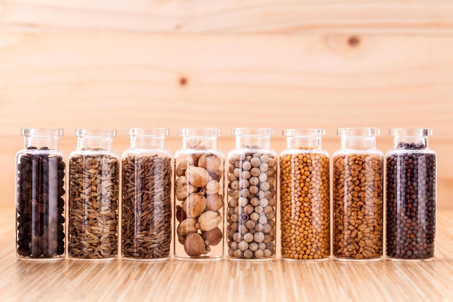 Spices in bottles photo