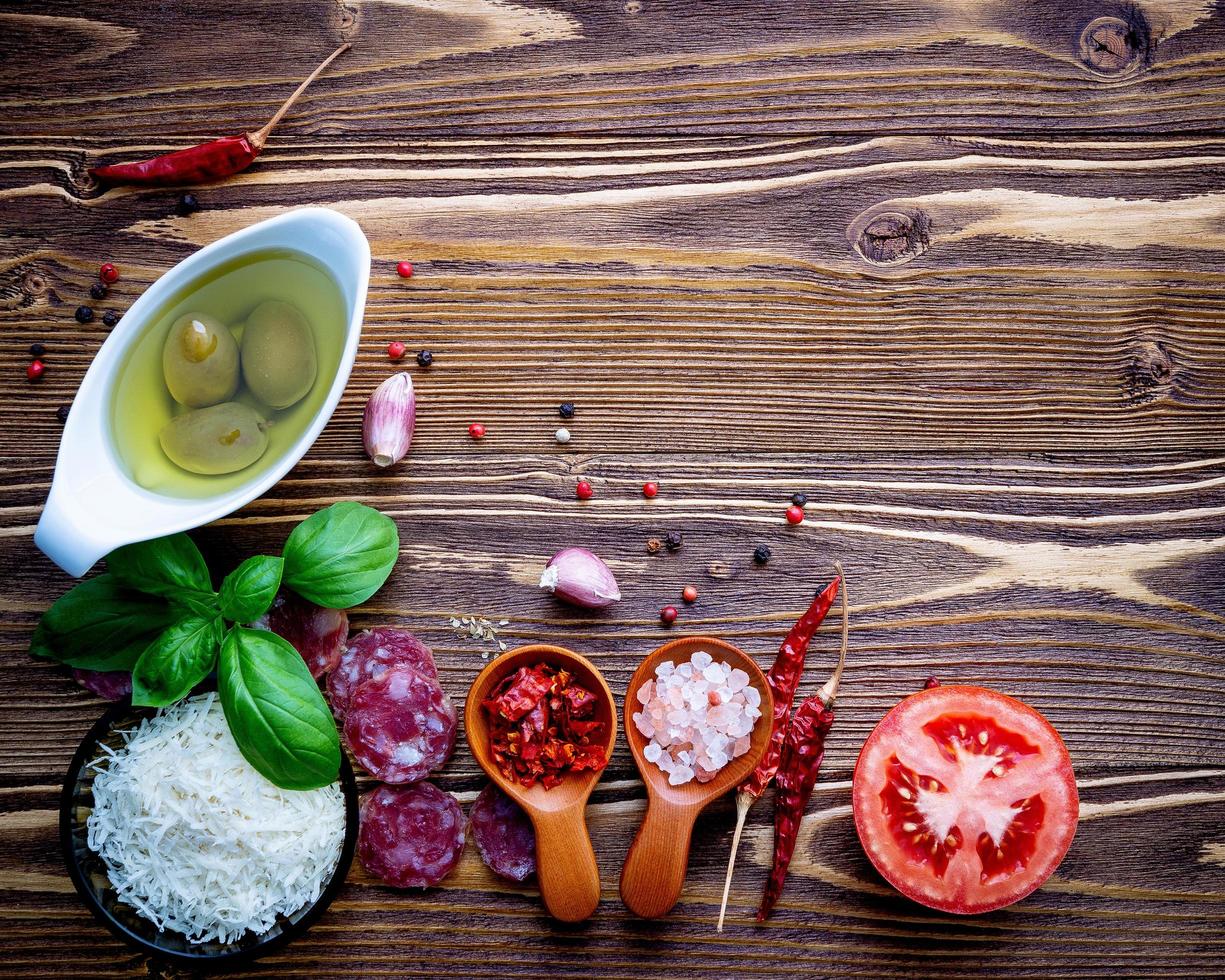 Fresh ingredients on a rustic wood table photo