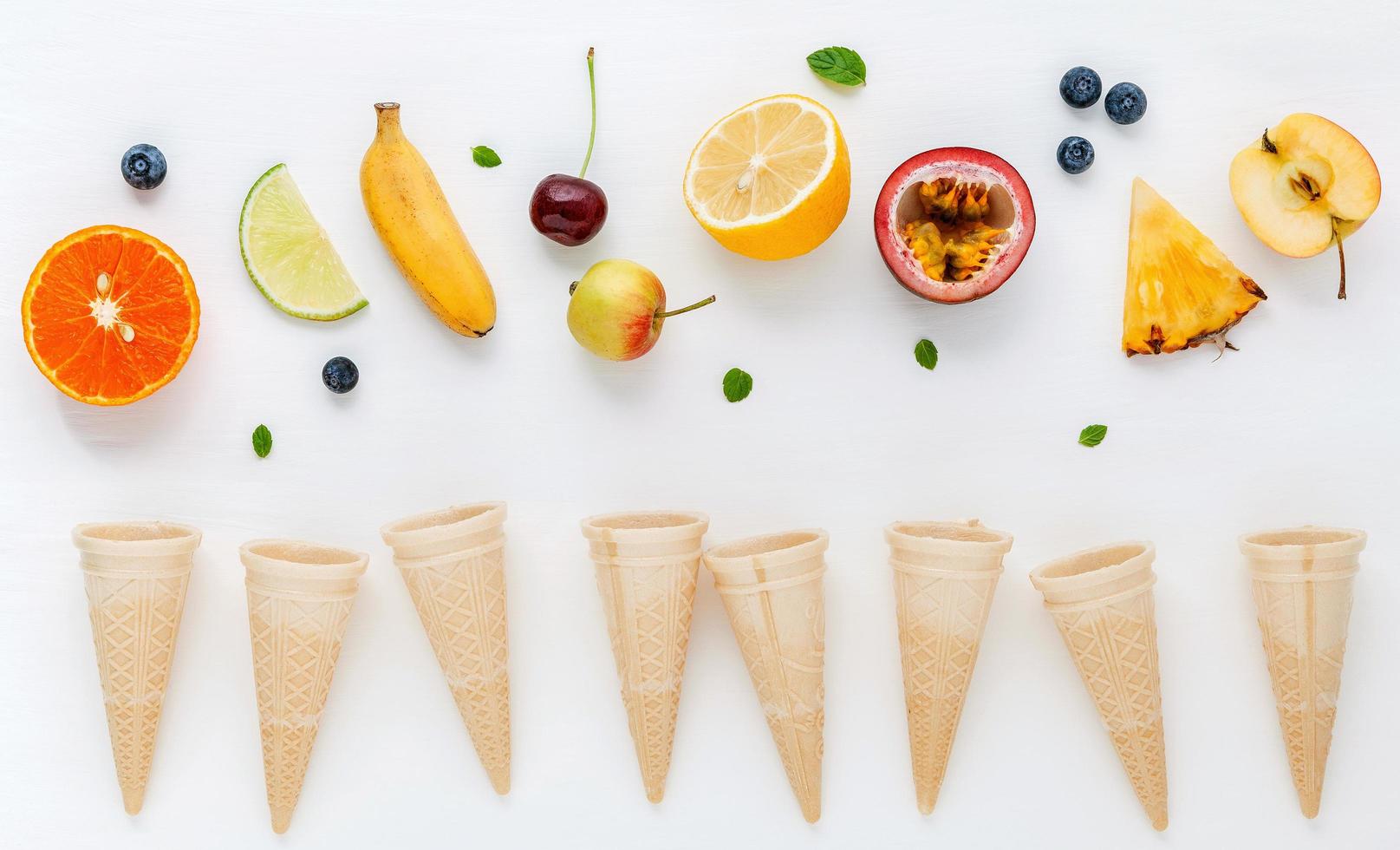 Top view of fruit and waffle cones photo