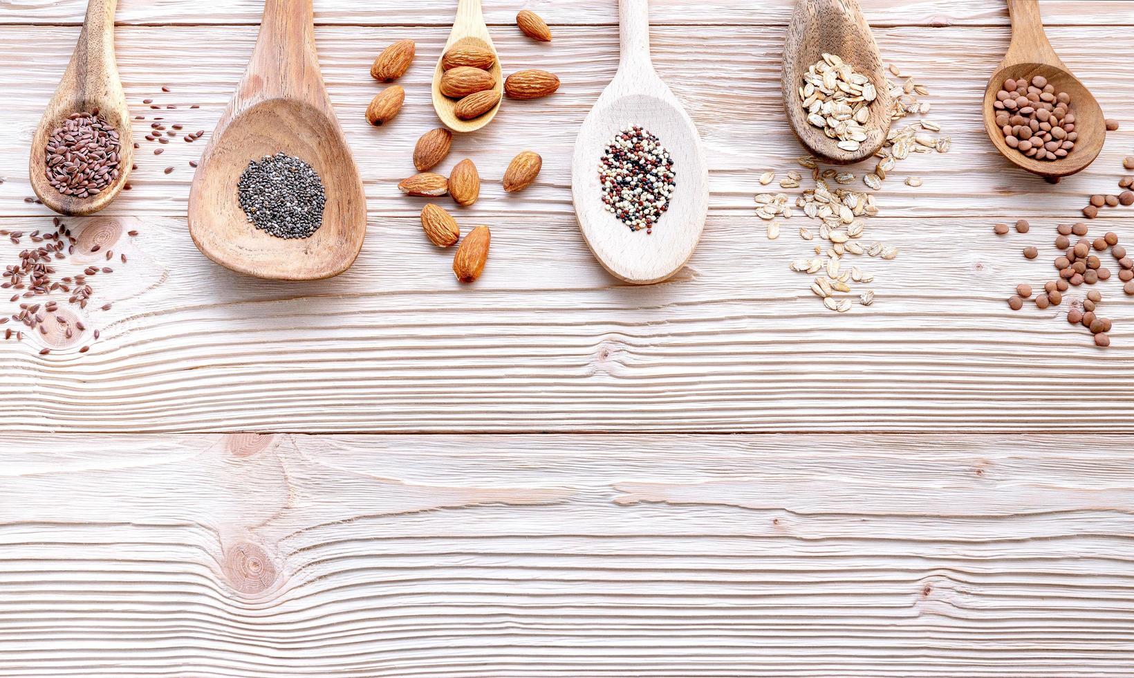 Spoons of nuts and grains photo