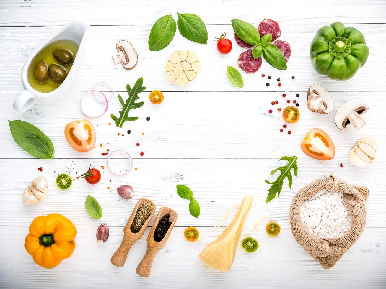 Fresh ingredients on a white wooden background photo