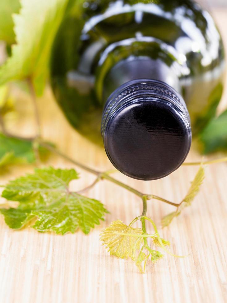 Wine bottle and ivy photo