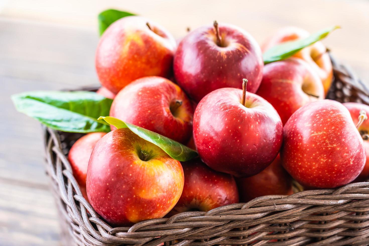 Red apples in basket photo