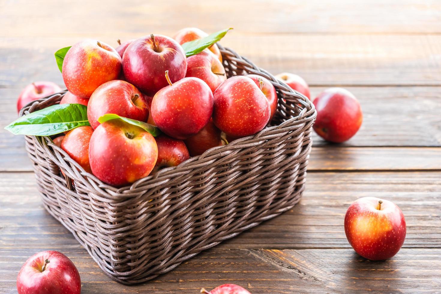 Red apples in basket photo