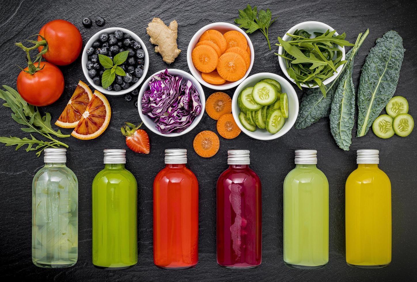 Bottles of fruit and veggie juice photo