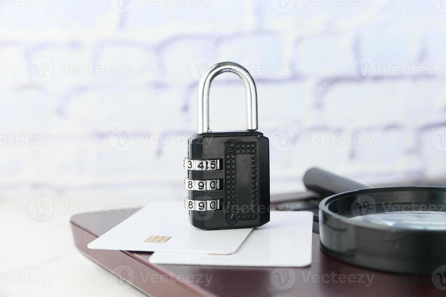 Black pad lock on a credit card, internet safety concept photo