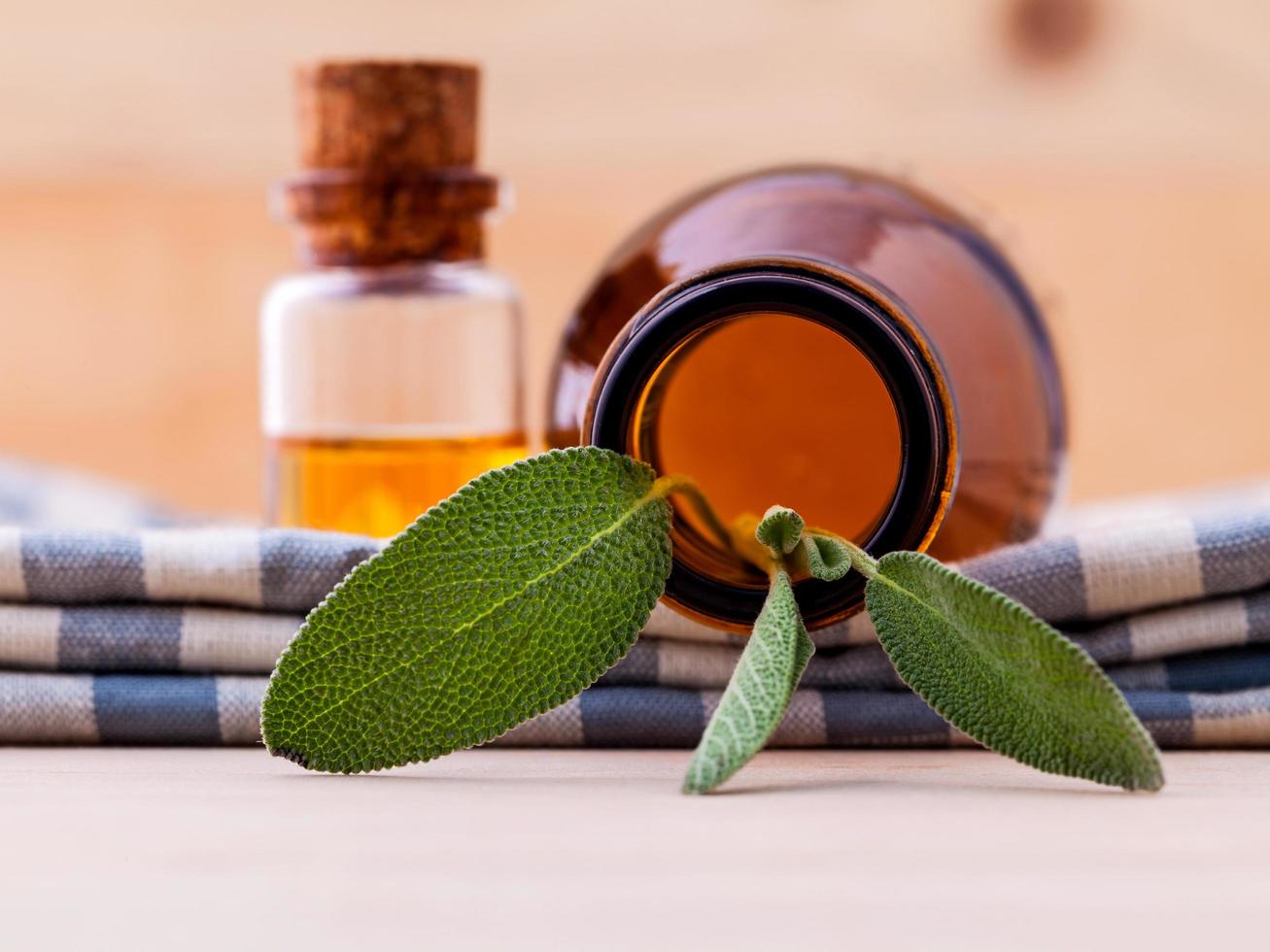 Sage leaves and a bottle photo