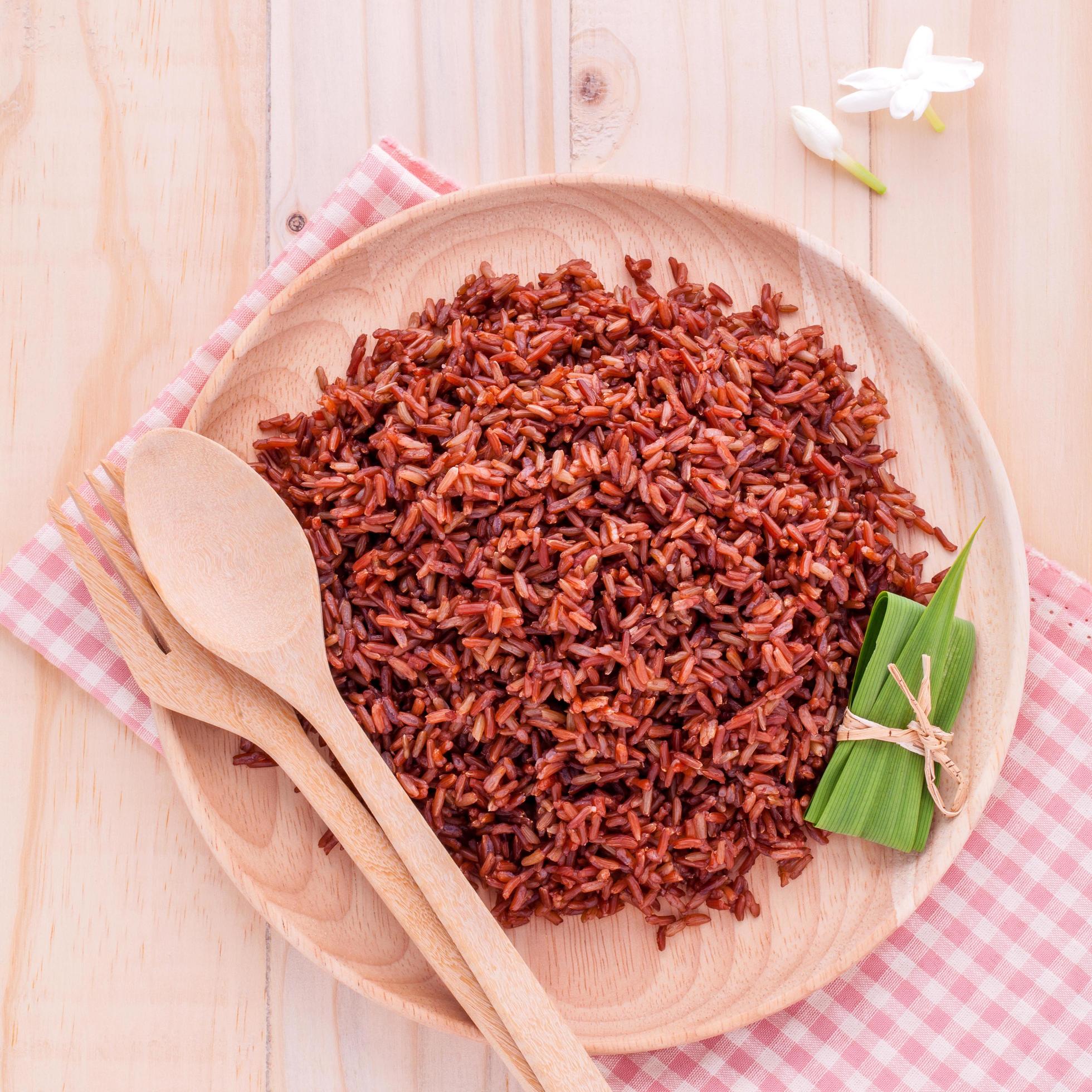 Whole grain rice on a plate 2060266 Stock Photo at Vecteezy