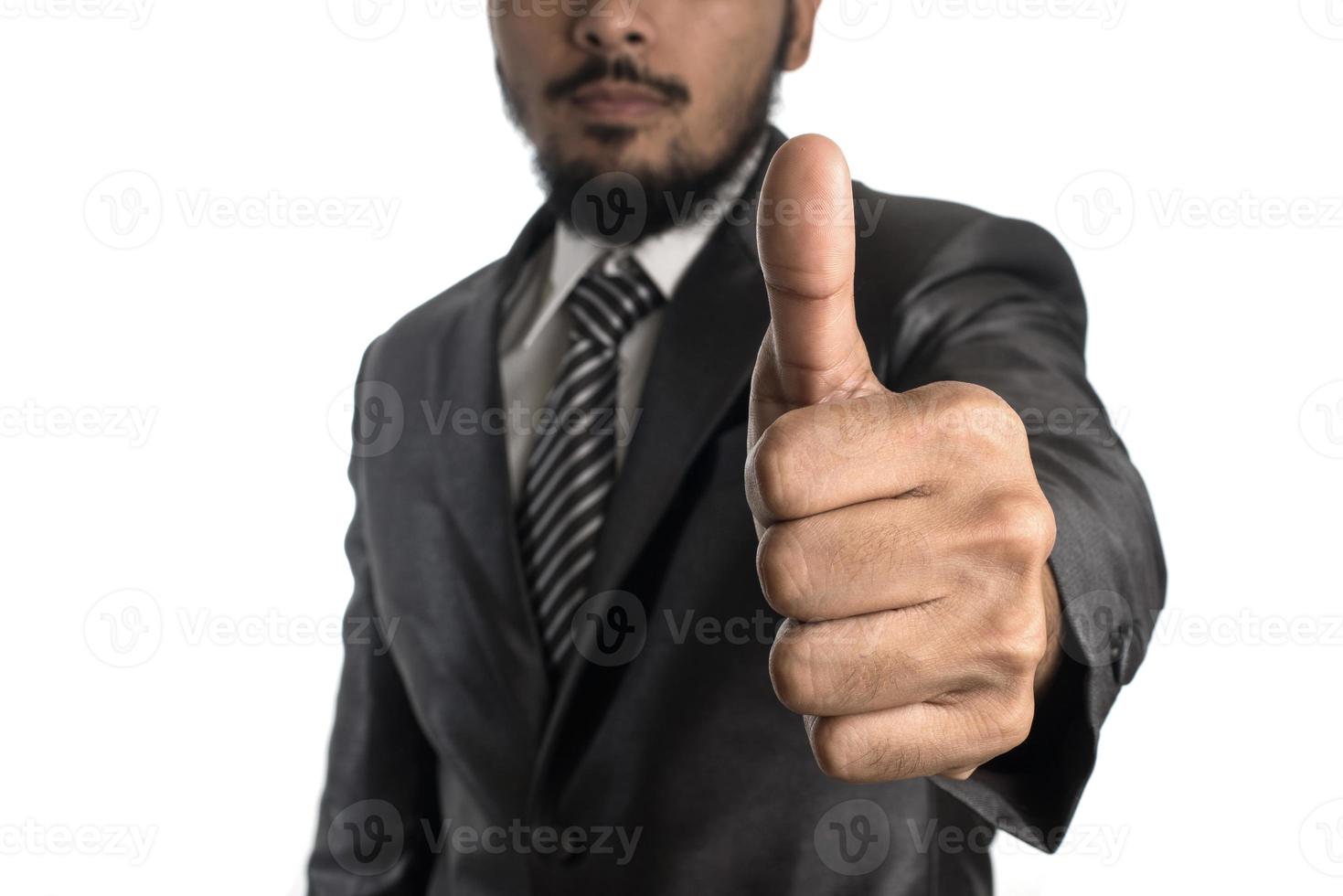 Confident young businessman in suit isolated on white background photo