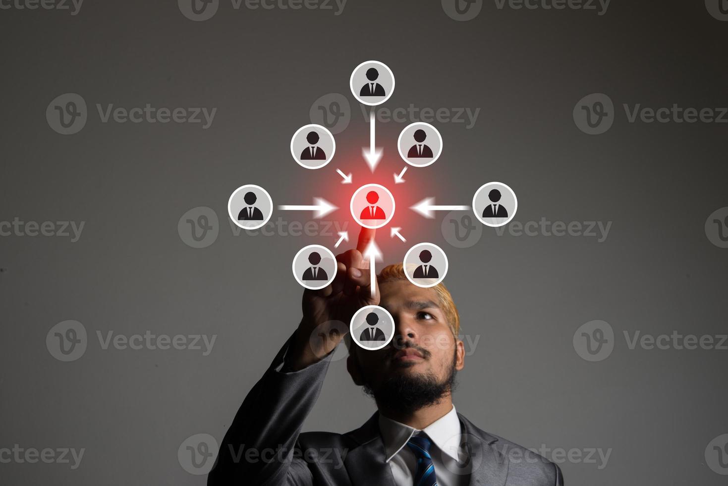 Young businessman with multimedia network icon graphics photo