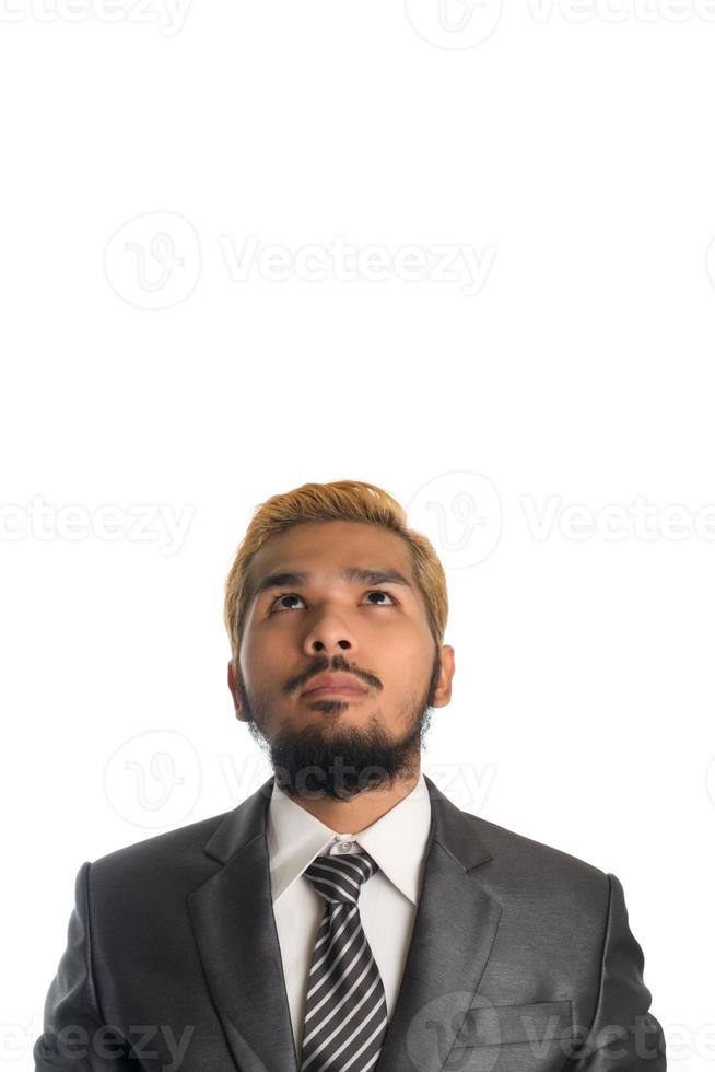 Confident young businessman in suit isolated on white background photo