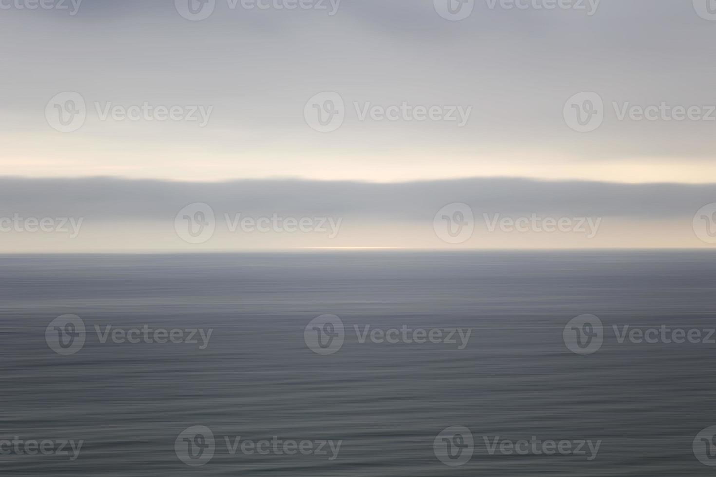 Calm ocean horizon photo