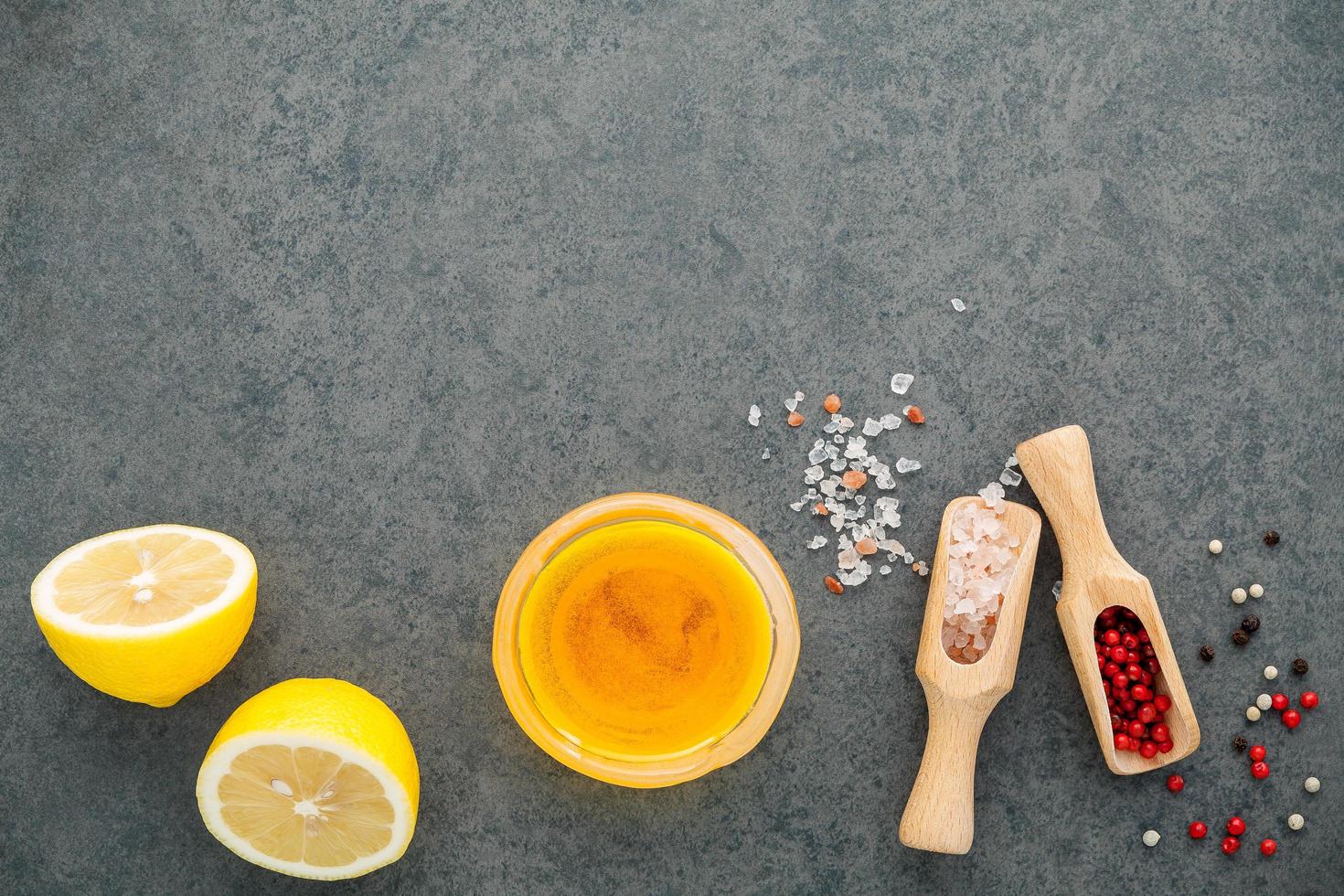 Lemon vinaigrette dressing ingredients with copy space photo