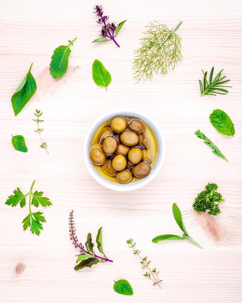 Olives and herbs photo