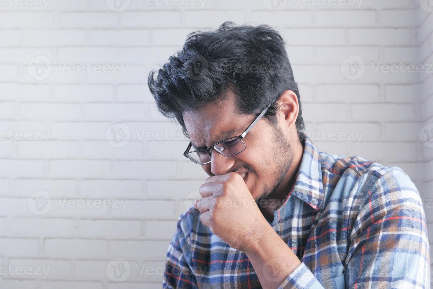 Asian man coughing photo