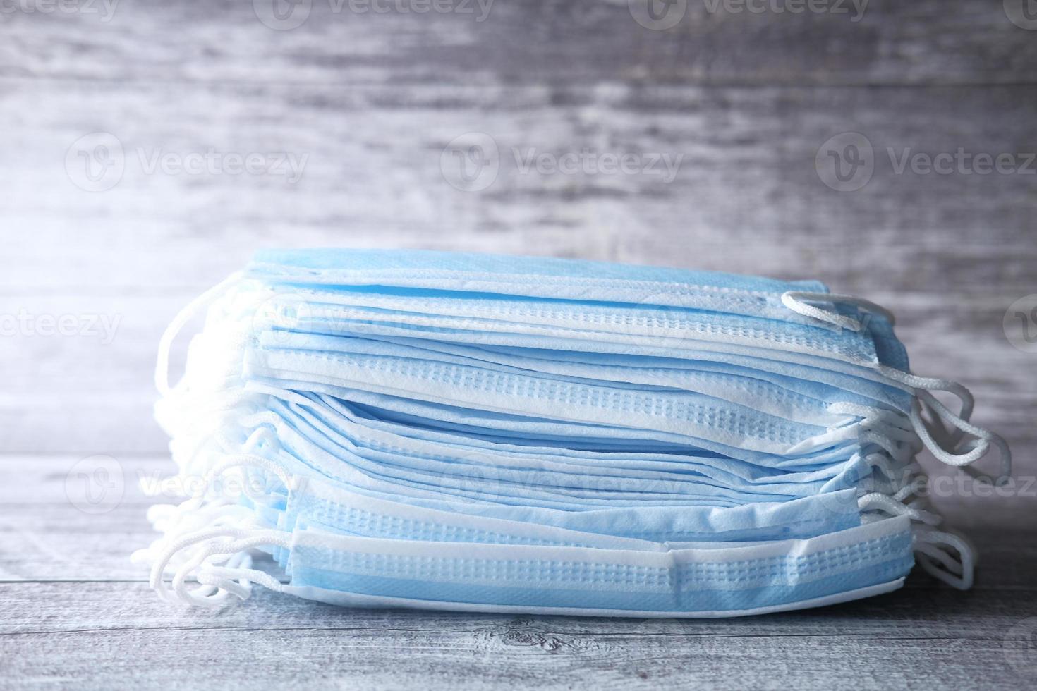Stack of blue surgical masks photo