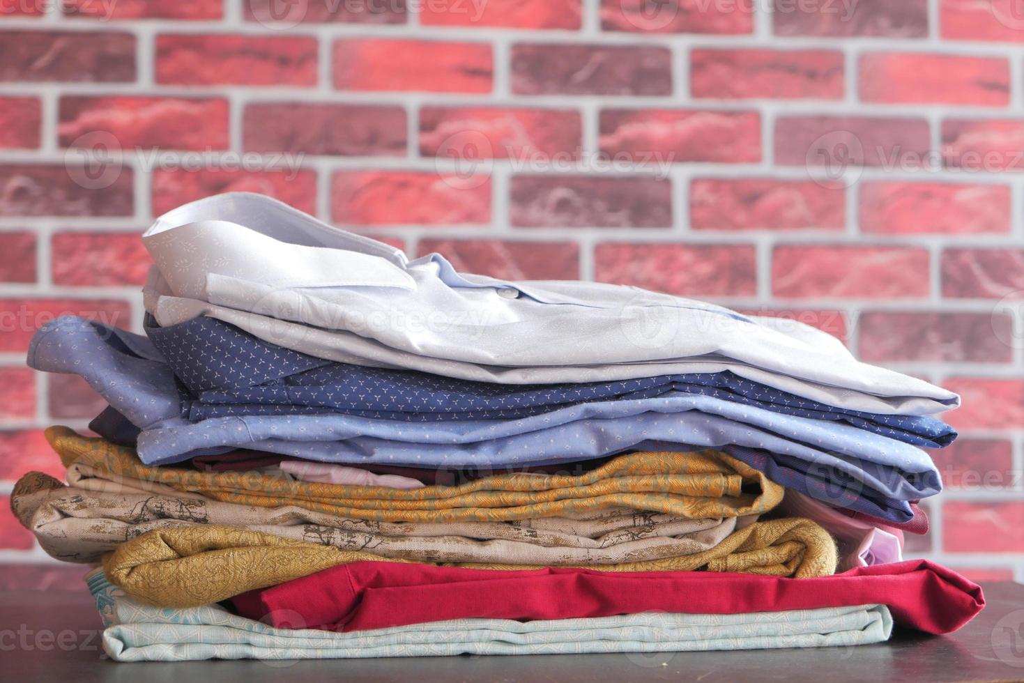 Folded stack of shirts photo